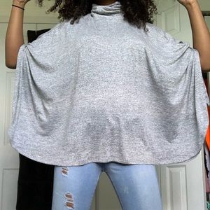 Grey turtleneck wing sweater top